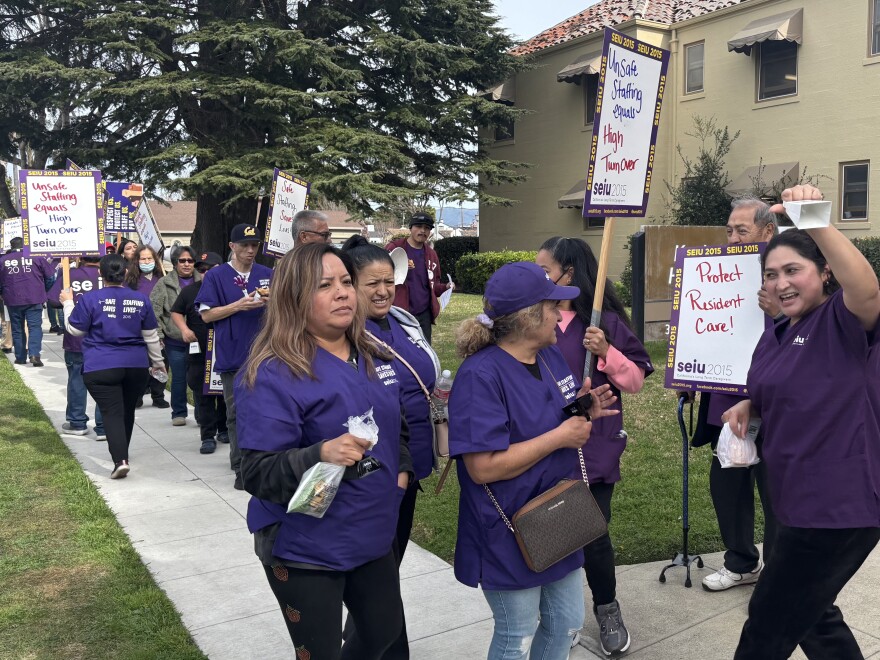 Outside Katherine Healthcare on Monday, Feb. about 50 workers rallied for their employer to finalize it. Service Employees International Union Local 2015, which represents them, says Katharine Healthcare is among some employers that are stalling the statewide contract.