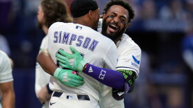 Rays third baseman Junior Caminero, right, celebrates with left fielder Chandler Simpson after the team defeated the Astros and clinched a playoff spot Friday, Sept. 11, 2026, in St. Petersburg.  