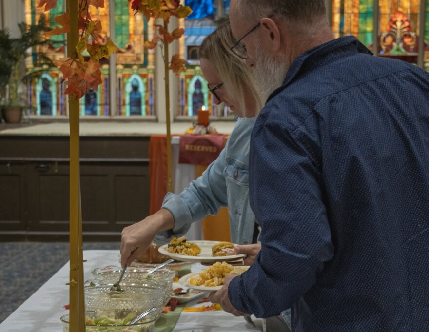 Residents dish up food at a recent EVPL SPEAK event