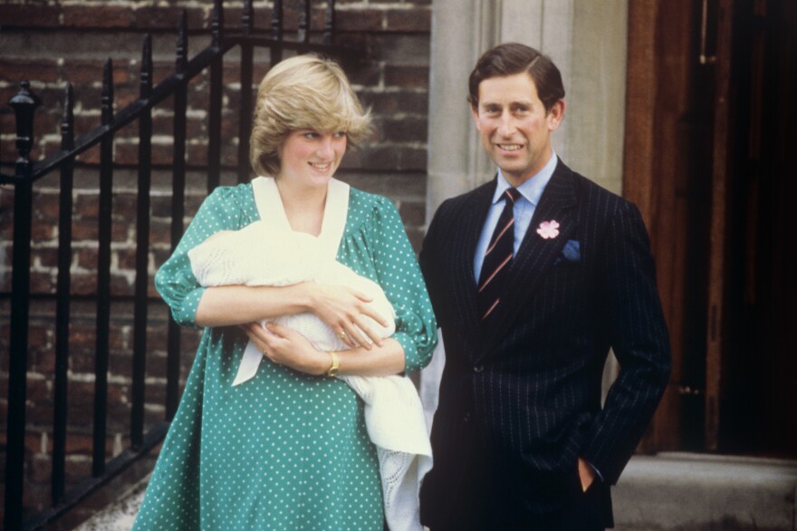 Prince Charles and Diana, Princess of Wales, pose outside the Lindo Wing of St. Mary's Hospital in London with their firstborn son, Prince William, in 1982.