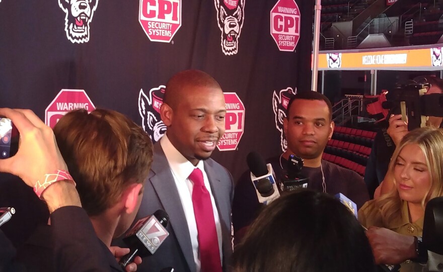 New N.C. State coach Justin Gainey answers questions following his introduction as the next men's basketball coach April 1, 2026, in Raleigh, N.C.