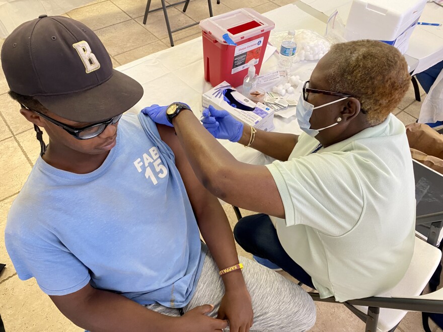 COVID-19 vaccinations underway at the Not My Son rally on June 25. 