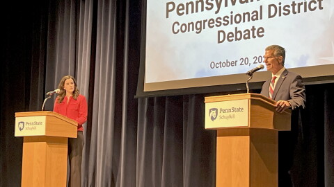 Democratic challenger Rachel Wallace, left, listens as Republican U.S. Rep. Dan Meuser speaks during a Tuesday, Oct. 20, 2026 debate between the two Pennsylvania 9th Congressional District candidates at Penn State Schuylkill in Schuylkill Haven.