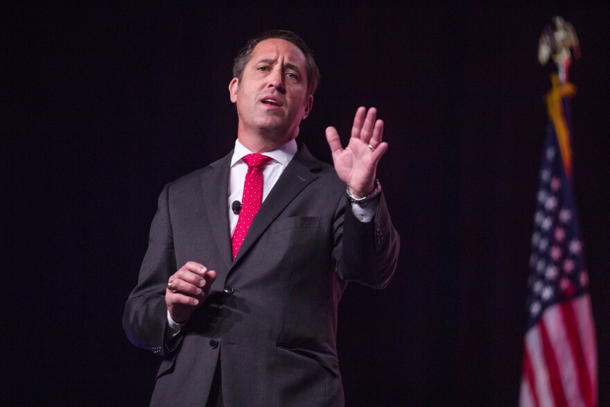 Former Comptroller Glenn Hegar speaking at the Texas Republican Convention in 2018. Hegar argued the new rule was simply clarifying existing state law so online marketplaces wouldn't become confused when they get audited.