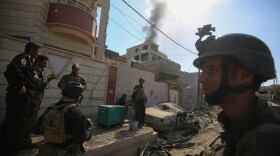 Smoke billows as Iraqi Counter-Terrorism Services (CTS) advance in West Mosul's Al-Najjar neighborhood on May 22, 2017, during the ongoing offensive to retake the area from Islamic State group fighters. (Ahmad al-Rubaye/AFP/Getty Images)