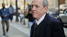 The Rev. James Brennan returns after a lunch break to Philadelphia Criminal Justice Center Mar. 26, 2012.