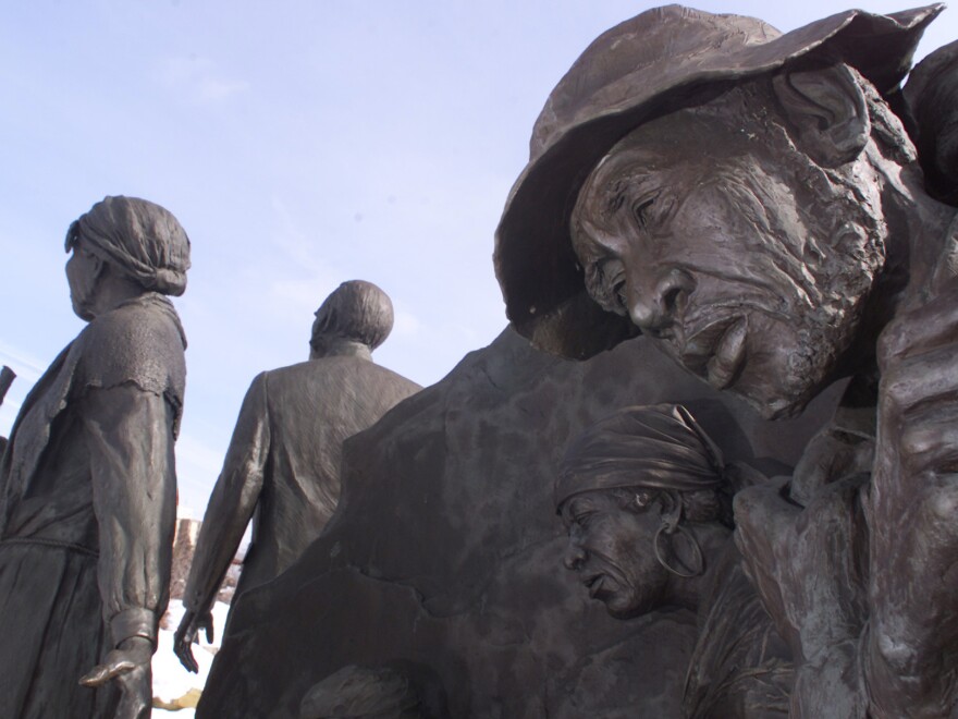 One of Ed Dwight's sculptures in Battle Creek, Mich., depicts escaped slaves along the Underground Railroad being led to freedom by Harriet Tubman and local abolitionist Erastus Hussey.