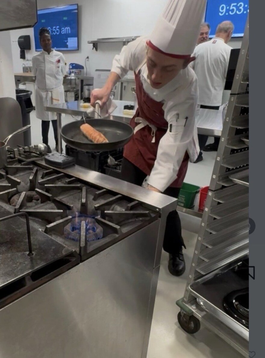 Ezrah Hanson competes in the Student Chef category at the American Culinary Federation's Southeast Regional in Winston-Salem on March 28. The A-B Tech alumnus won a gold medal and scored third highest in the nation