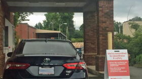 Drivers remain in their cars and administer the self-swab with the guidance of a CVS pharmacy employee.