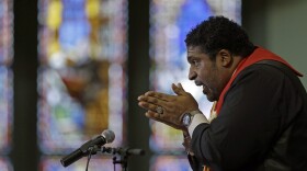 In this Wednesday, June 24, 2015 file photo, Rev. William Barber, president of the state chapter of the NAACP and architect of the protests known as "Moral Monday, speaks during a Bible study at Pullen Memorial Baptist Church in Raleigh, N.C. 