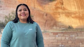 IMCrystal Tulley-Cordova stands in front of Window Rock near the Navajo Nation's tribal government buildingsG_6080.jpeg