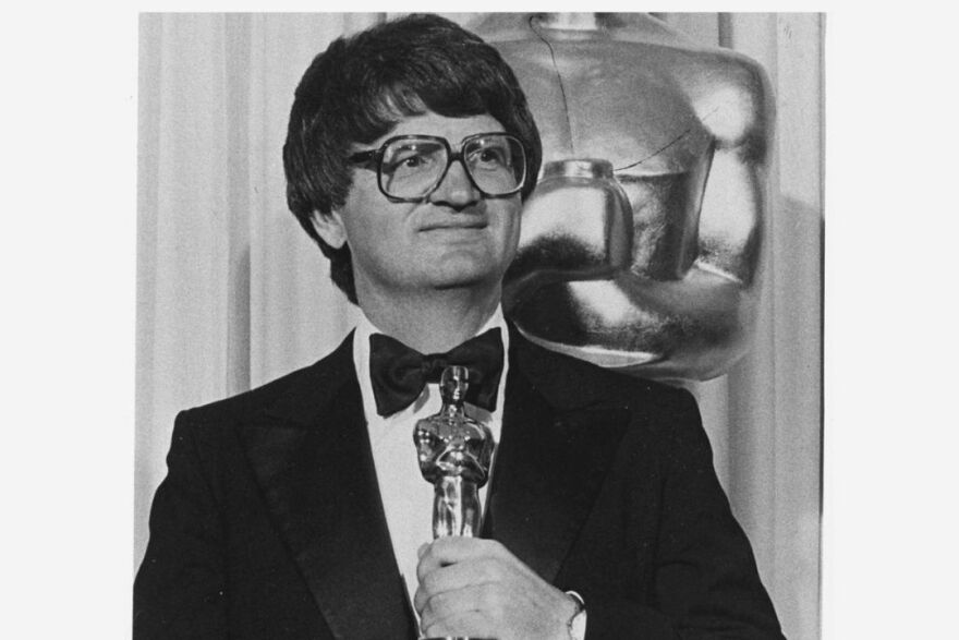 Steve Tesich is holding his OSCAR for Best Screenplay for the 1979 film Breaking Away.