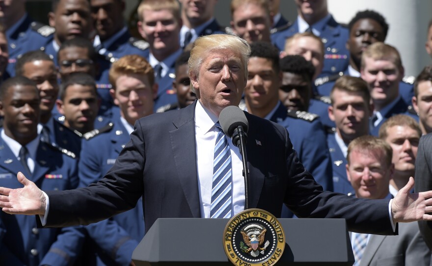 President Trump speaks in the Rose Garden of the White House during Tuesday's presentation of the Commander-in-Chief's Trophy to the Air Force Academy football team.