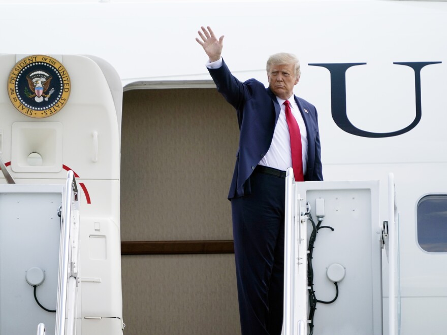 President Trump boards Air Force One on Tuesday at Andrews Air Force Base in Maryland.