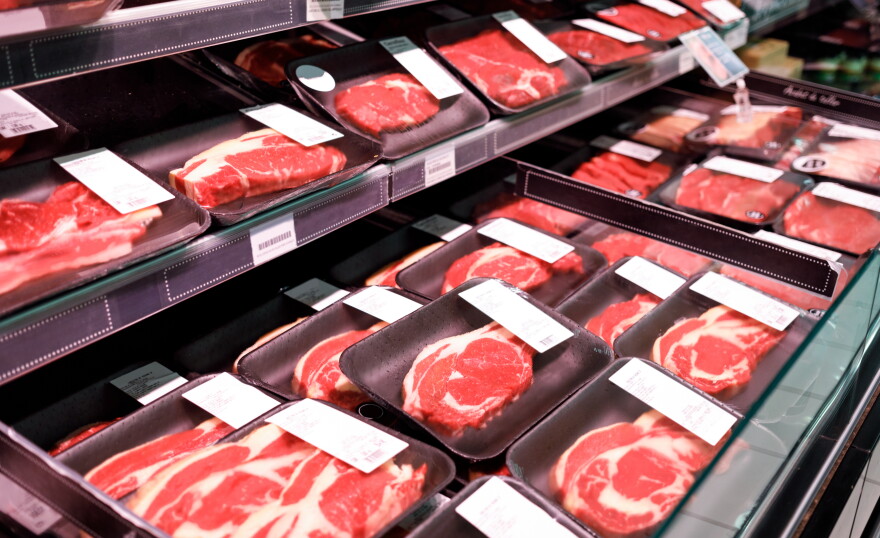 a package of ground beef on the shelf
