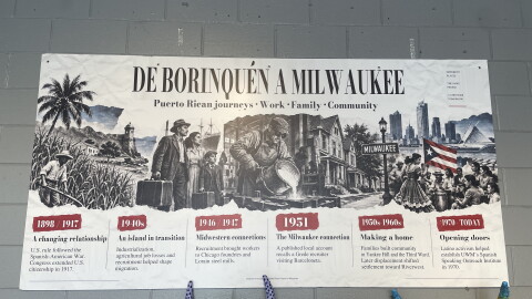 An installation at the Puerto Rican Festival of Wisconsin details the history of Puerto Ricans moving to the state.