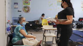 Residents affected by Hurricane Fiona rest at a school being used as a storm shelter in Salinas, Puerto Rico, Monday, Sept. 19, 2022. (AP Photo/Stephanie Rojas)