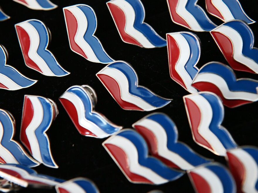 Romney campagin pins are on display for sale in the GOP gift shop at the Republican National Convention in Tampa.