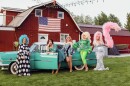 Drag queens pose in front of a barn in Daniel at the annual Not Your Mamma's Backyard Drag Show