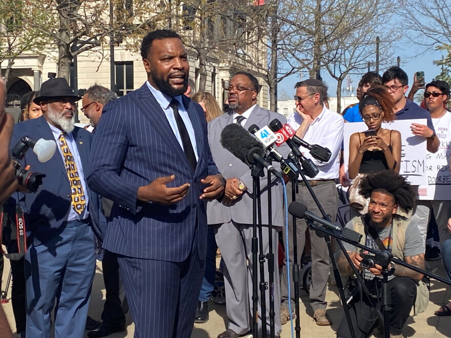 Texas civil rights attorney Lee Merritt, who is representing Ralph Yarl’s family, addresses protesters at the federal courthouse in downtown Kansas City on Tuesday afternoon.