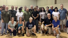 Toys for Tots volunteers pose for a photo after moving toys into the City Light Church gym on Sunday, Nov. 9, 2025.