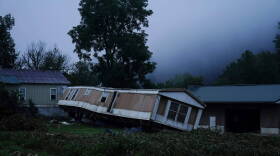 A trailer home was swept away by massive flooding near Lost Creek, Ky.  As residents continued cleaning up from the late July floods that several people, rain started falling on already saturated ground in eastern Kentucky late Friday morning. (Brynn Anderson/AP)
