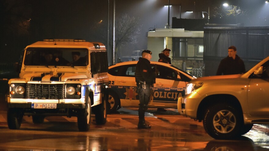 Police block off the area around the U.S. Embassy in Montenegro's capital, Podgorica. An unknown assailant hurled a hand grenade toward the embassy at around midnight local time on Thursday and then killed himself with another explosive device.