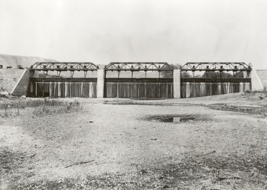 A historic photograph of the Vandalia diversion dam, taken 1921, shortly after its completion. More than a century after it was built, the dam is still held up by the original concrete and steel.