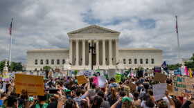 People protest in response to the Dobbs v Jackson Women's Health Organization ruling in front of the U.S. Supreme Court on June 24, 2022 in Washington, DC. The Court's decision in Dobbs v Jackson Women's Health overturns the landmark 50-year-old Roe v Wade case and erases a federal right to an abortion. (Brandon Bell/Getty Images)