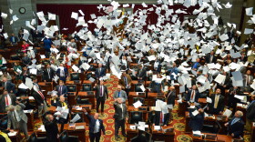 MIssouri House legislators mark the end of the session by ceremonially tossing  papers Friday afternoon