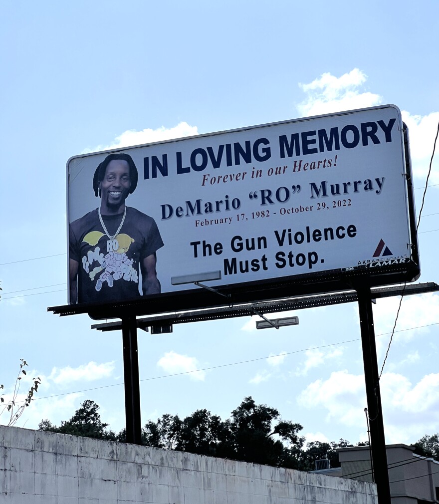 A billboard memorial on S. Monroe Street for DeMario "Ro" Murray, who died in a shooting outside a liquor store in Tallahassee, calls for an end to gun violence nearly one year after Murray's death. The billboard was paid for by Mutaqee Akbar, a Tallahassee-based attorney and president of the local NAACP.