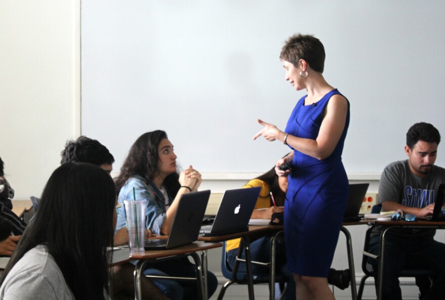 St. Mary's University Professor Meghann Peace speaks to a student in her Heritage Spanish class on Sept. 23, 2019.