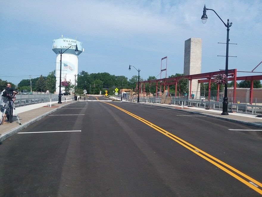 A new extension of W. Main Street in the Village of Lancaster reconnects a district devastated by fire 60 years ago but not fully restored