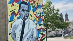 Mural of John Lewis outside the Matt Hope Urban Hope Center on Paderewski Drive. (Artist: Edreys Wajed. Photo: Jeff Z. Klein)
