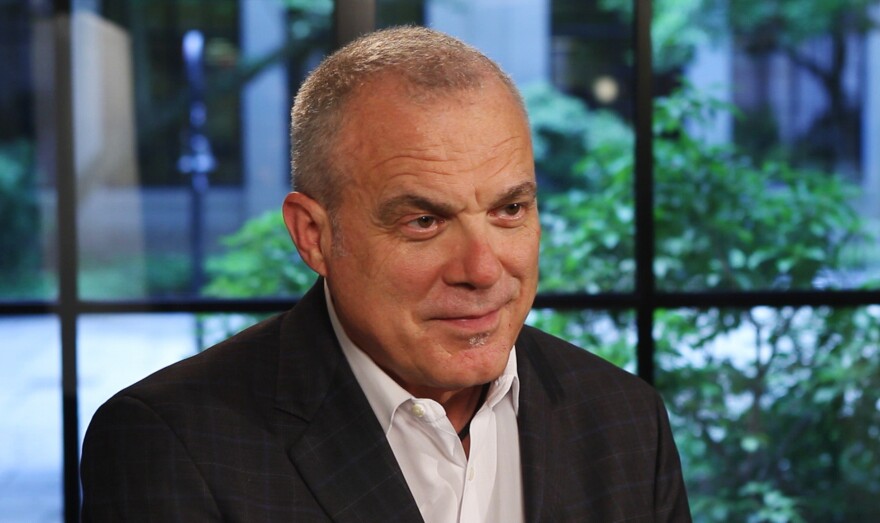 Aetna announced one of its largest pay hikes recently. CEO Mark Bertolini says he believes it largely could pay for itself by making workers more productive.