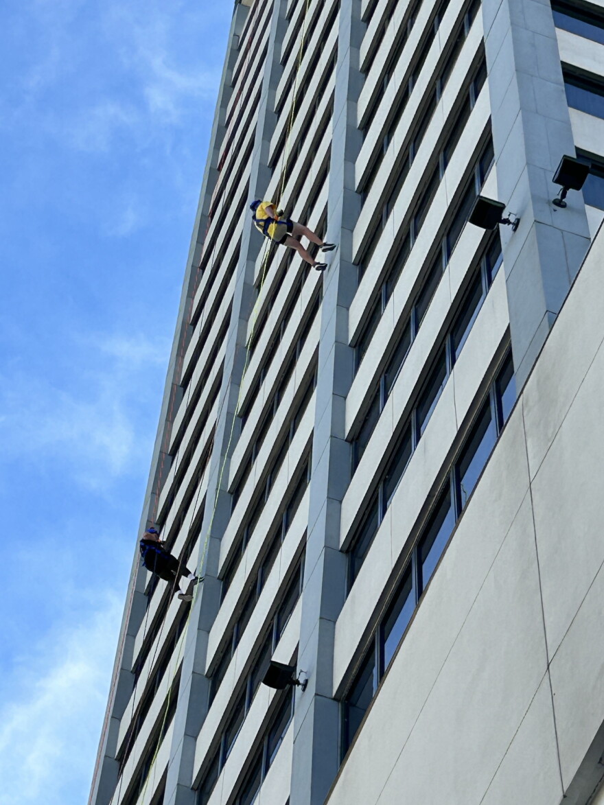 People rappel downtown South Bend's Liberty Tower this week to raise money for Youth Service Bureau.