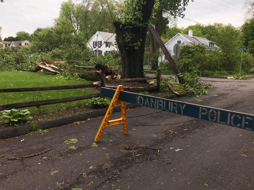 The part of the street where Ridge Road meets Lexington Avenue in Danbury was closed after a telephone pole snapped and took down power lines.  