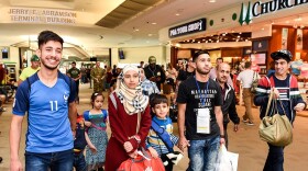 A refugee family arrives at the Louisville Muhammad Ali International Airport