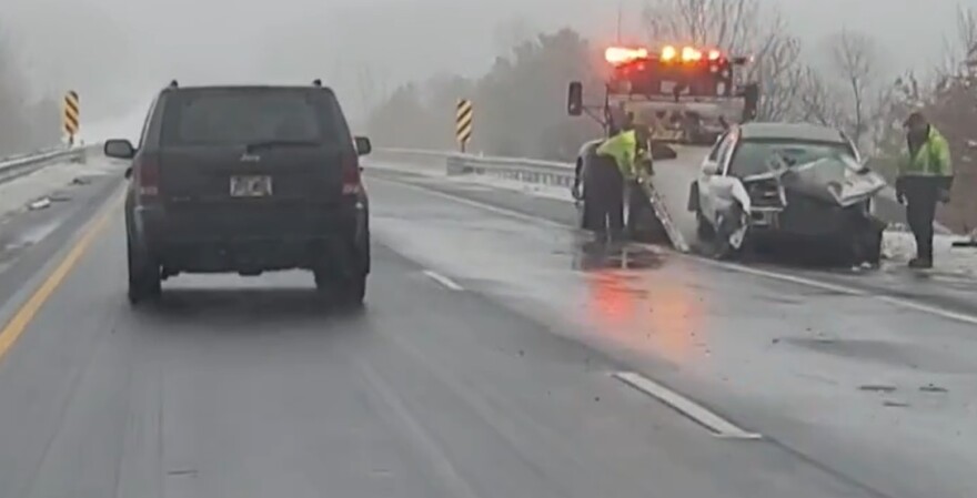 Driver moves over to protect roadside crew