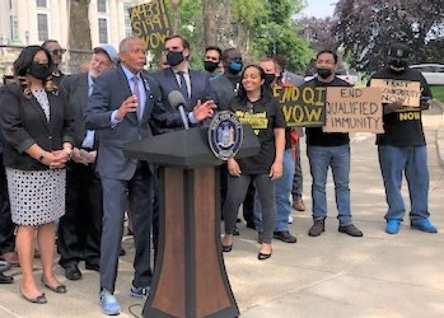 Senate sponsor Robert Jackson with backers at the rally outside the state capitol. Photo by Karen DeWitt.