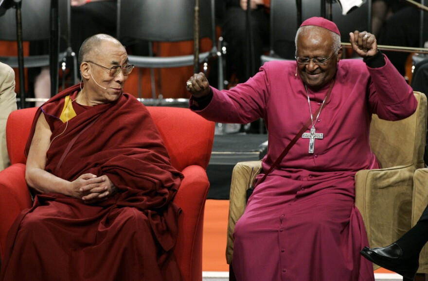 <p>The Dalai Lama looks on as Tutu does a dance after remarking that his wireless microphone made him feel like pop star Michael Jackson, during an event at the University of Washington in Seattle in 2008.</p>