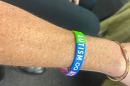 Autism awareness bracelet worn by an audience member at the Aug. 31, 2026, ABA Task Force meeting in Tallahassee.