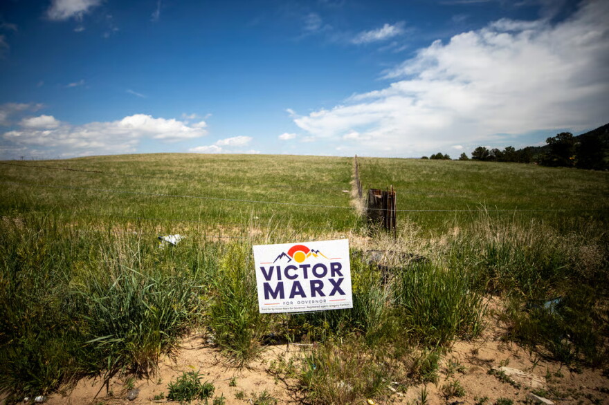 A Victor Marx campaign sign planted on the side of the road to Palmer Lake, north of Colorado Springs. June 8, 2026.