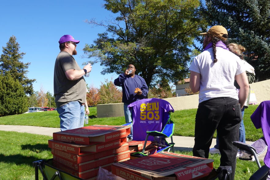 Field organizers from SEIU provide union workers at Eastern Oregon University in La Grande with Pizza Hut to celebrate the tentative collective bargaining agreement reached Monday, Sept. 28, 2026, just before a strike was scheduled to begin.