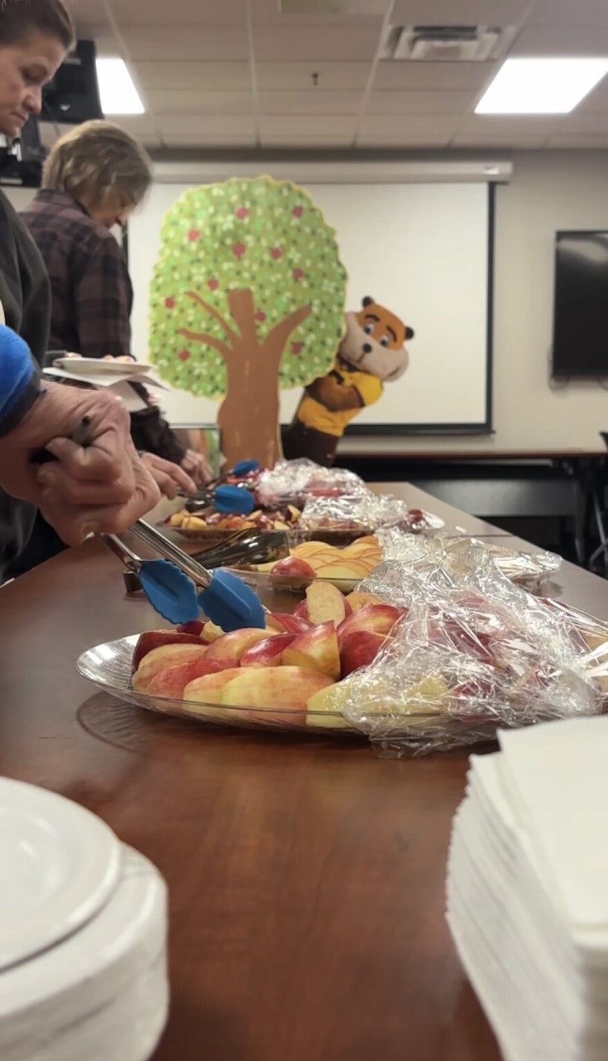 The University of Minnesota's Goldy Gopher watches over apple tasters choosing their samples Oct. 22, 2025, at the North Central Research and Outreach Center in Grand Rapids.
