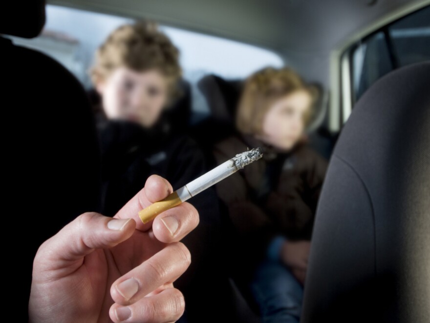kids smoking cigarettes - Stock Image - C004/8330 FDA strengthens regulations to curb