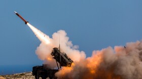 FILE - In this image released by the U.S. Department of Defense, German soldiers assigned to Surface Air and Missile Defense Wing 1, fire the Patriot weapons system at the NATO Missile Firing Installation, in Chania, Greece, on Nov. 8, 2017. U.S. officials say the Pentagon is expected to announce that it will provide about $6 billion in long-term military aid to Ukraine. It will include much sought after munitions for Patriot air defense systems and other weapons. (Sebastian Apel/U.S. Department of Defense, via AP, File)