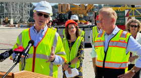 Joe Nolan, the chairman and CEO of Eversource, with Gov. Ned Lamont and Katie Dykes, the commissioner of energy and environmental protection, at an event last fall promoting electricity generated by off-shore wind.