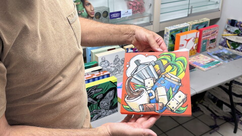 Krave holding one of the various 8x8 pieces that'll be available at El Fresco's grand opening