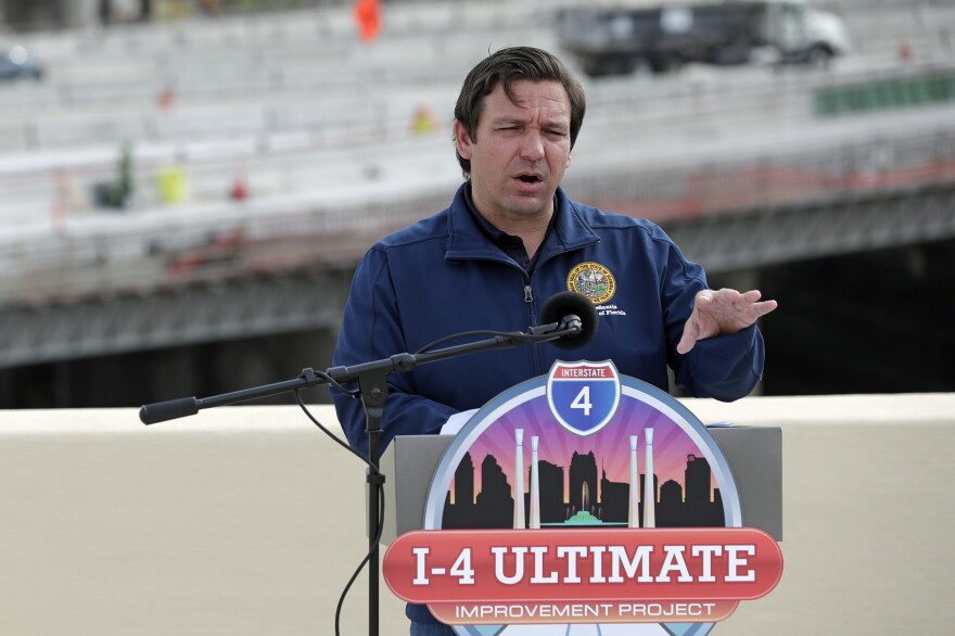 FILE - Florida Gov. Ron DeSantis speaks at a news conference Monday, May 18, 2020, in Orlando, Fla.